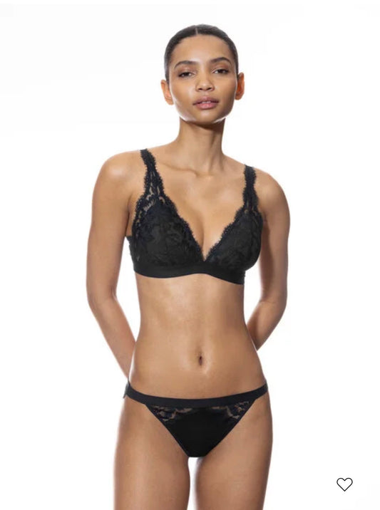 Woman wearing Triangle non-wired bra by MEY from the Serie Poetry Vogue collection in Black